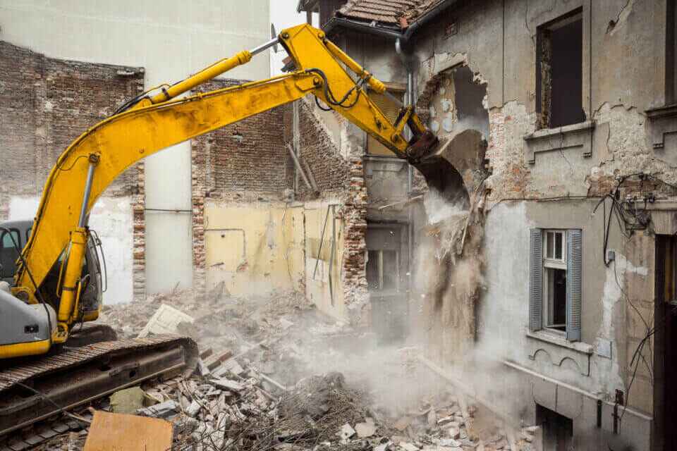 Excavator Demolishing Building in Ontario, Canada 

